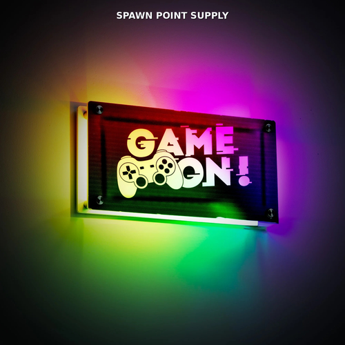 Game On RGBIC LED light box wall mounted showing multi-color rainbow gradient lighting effect in dark room