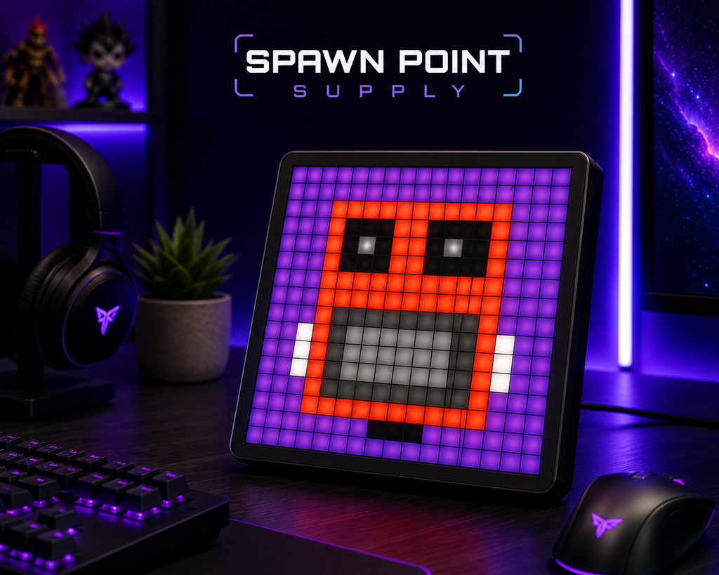 16x16 LED pixel display showing red pixel art character on gaming desk with keyboard and mouse in purple RGB lighting