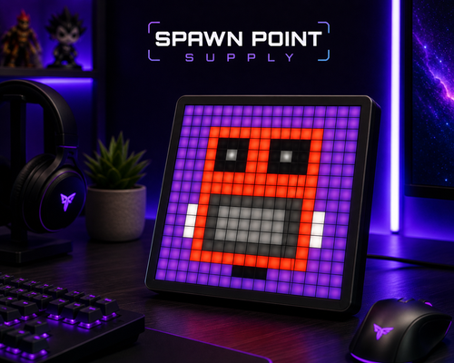16x16 LED pixel display showing red pixel art character on gaming desk with keyboard and mouse in purple RGB lighting