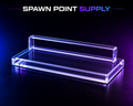 Clear acrylic SNES and SFC game cartridge display stand on dark surface with purple lighting