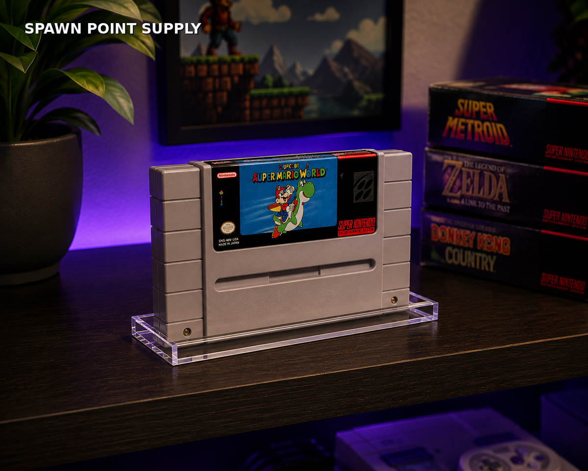 SNES Super Mario World cartridge displayed upright on clear acrylic stand in retro gaming setup