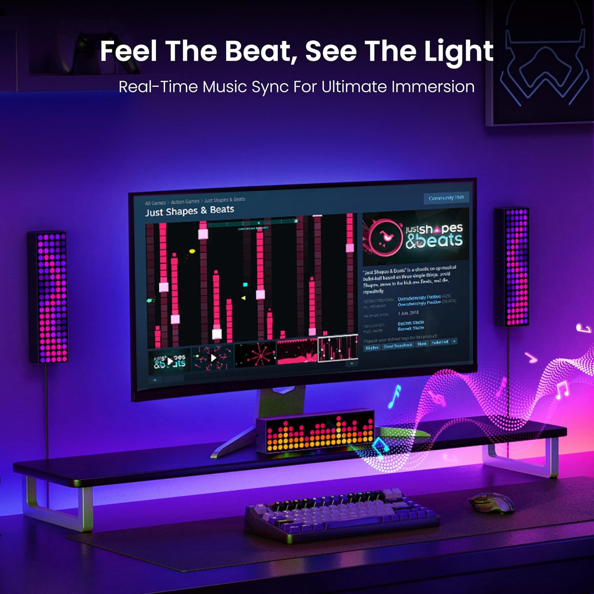 Computer setup with music software on screen, surrounded by colorful LED lights.